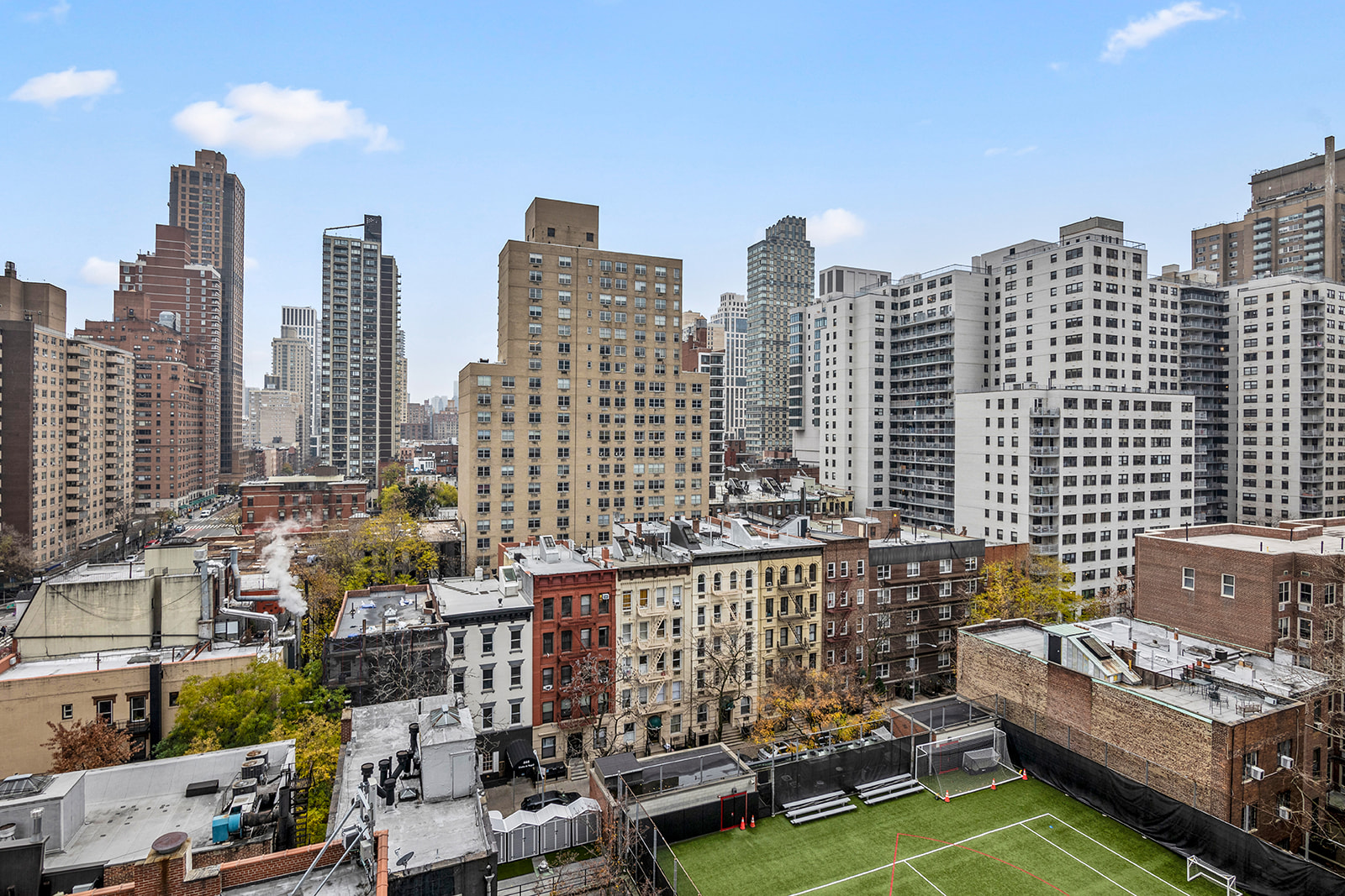 360 East 88th Street, Unit 10A Manhattan, NY 10128 - Photo 5 of 7 a view of city with tall buildings