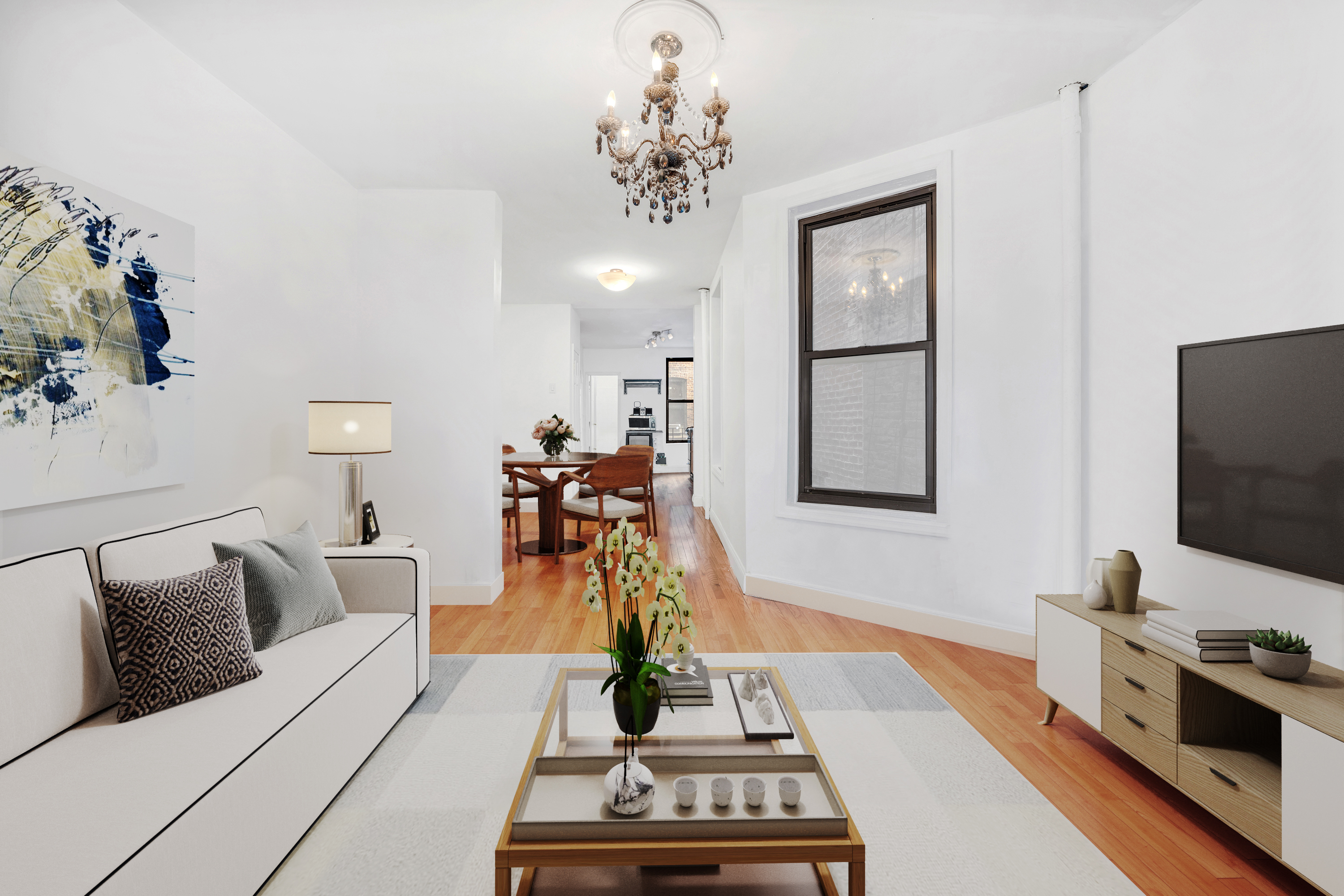 112 East 98th Street, Unit 4W Manhattan, NY 10029 - Photo 3 of 6 a living room with furniture and a flat screen tv
