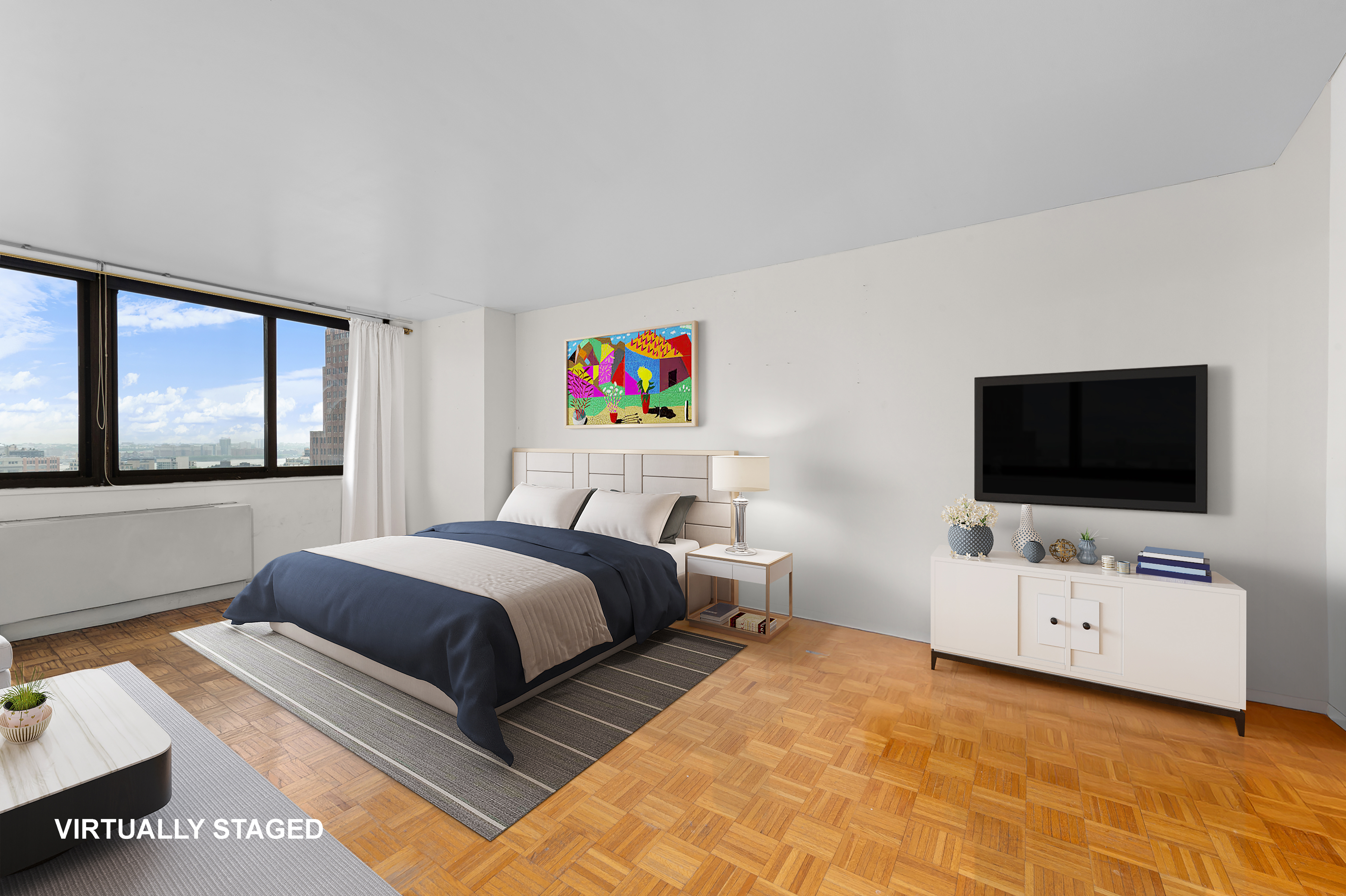 376 Broadway, Unit 24G Manhattan, NY 10013 - Photo 4 of 8 a bedroom with a bed and a flat screen tv