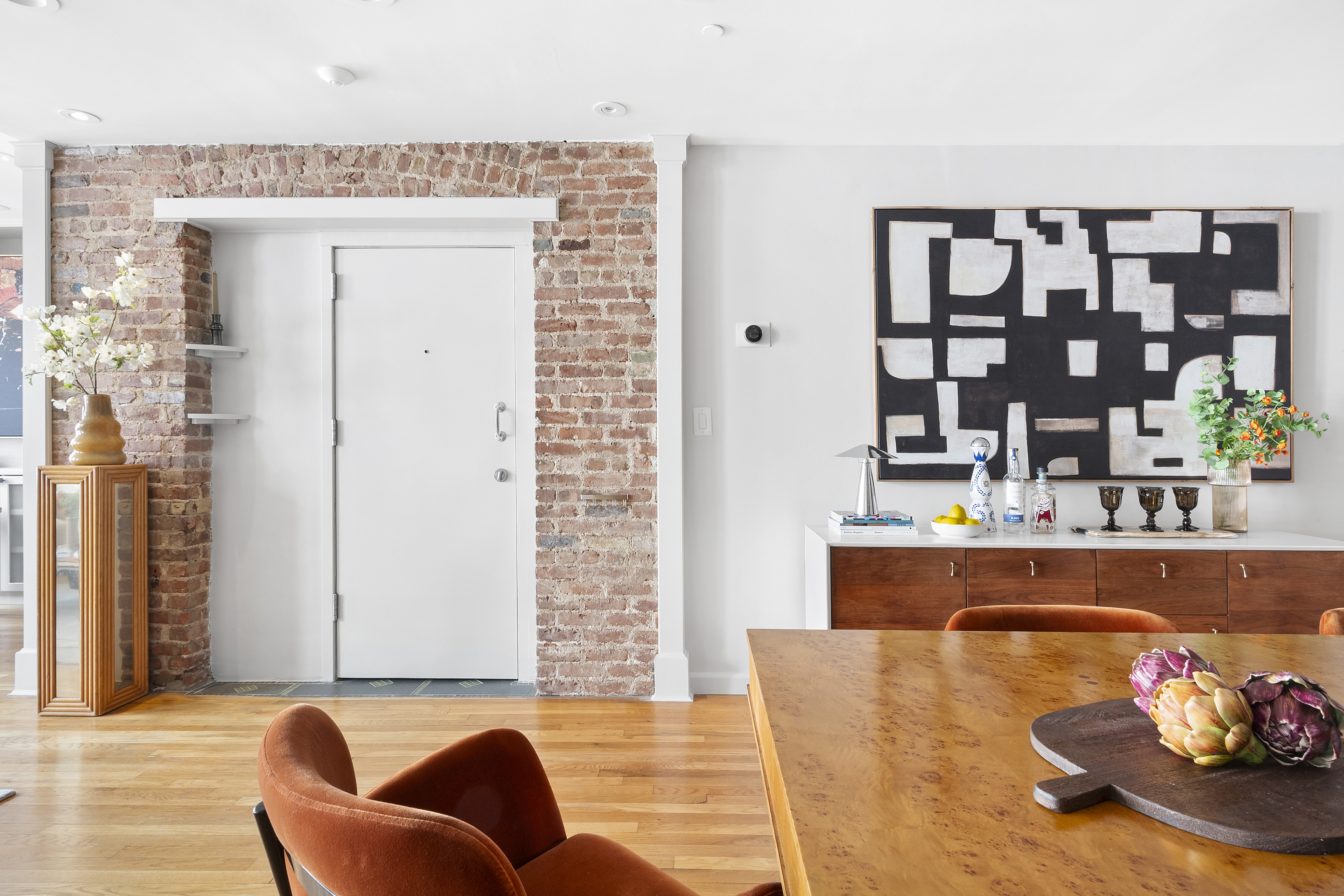 120 West 20th Street, Unit PH Manhattan, NY 10011 - Photo 4 of 15 a living room with furniture and a rug