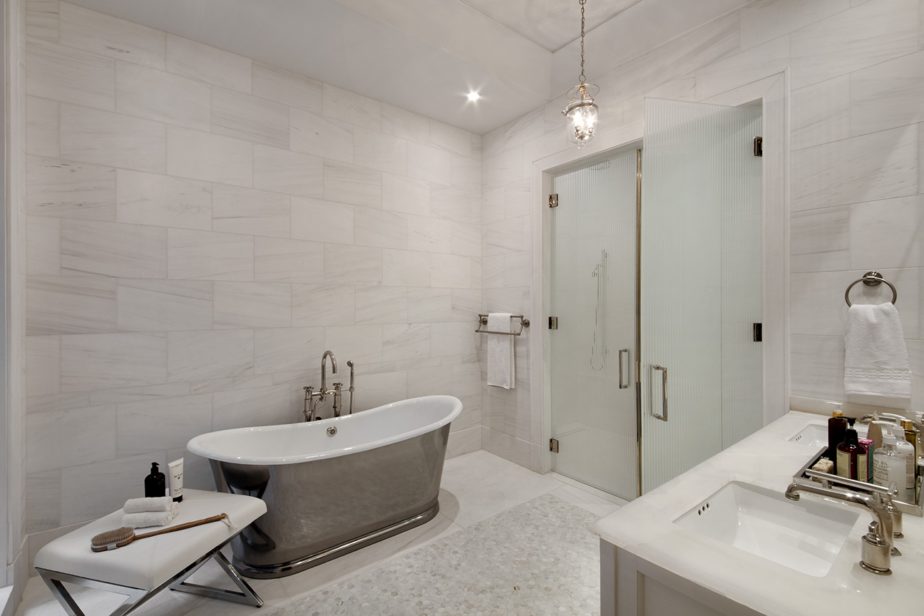 1110 Park Avenue, Unit C Manhattan, NY 10128 - Photo 6 of 9 a bathroom with a sink and a mirror