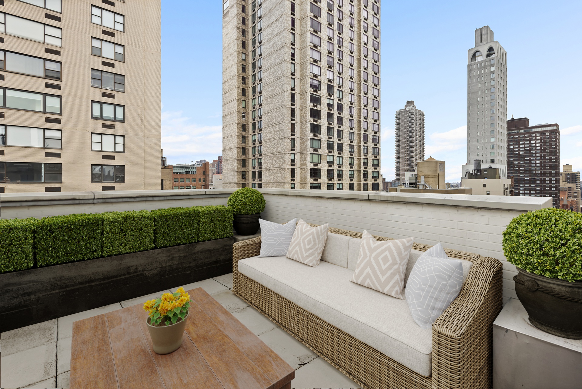 1055 Park Avenue, Unit PH Manhattan, NY 10028 - Photo 16 of 19 a view of city from balcony with outdoor seating