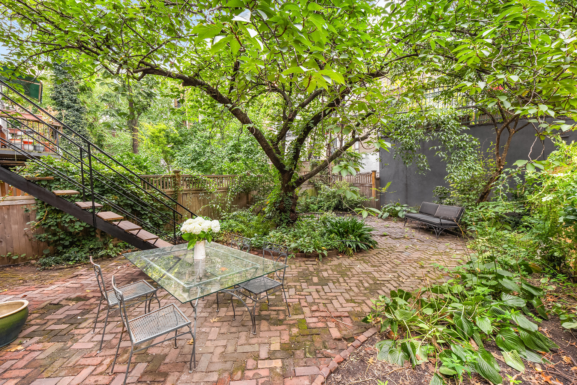 128 State Street, Unit 2 Brooklyn, NY 11201 - Photo 6 of 15 a pathway of a yard