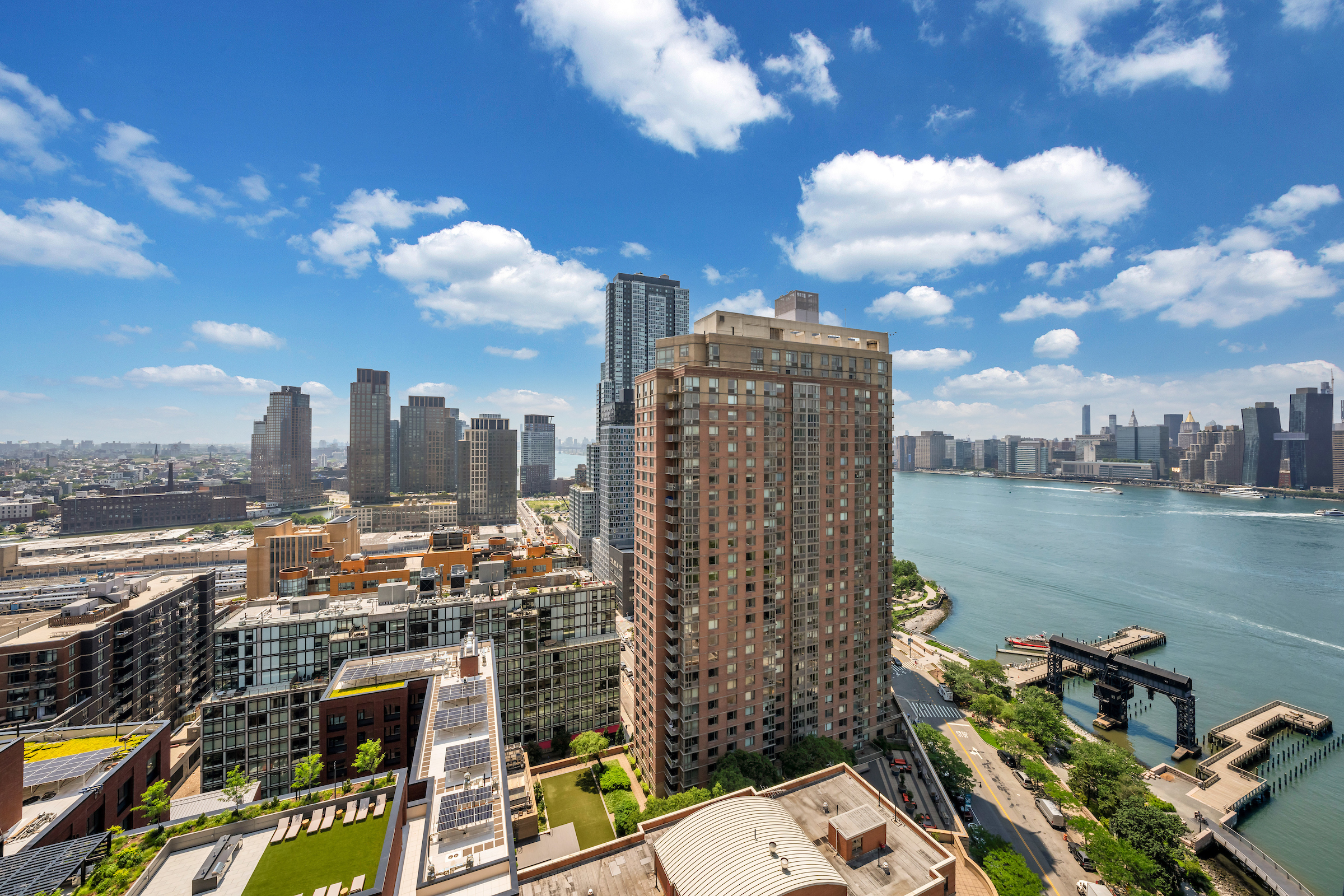 4-74 48th Avenue, Unit 27A Queens, NY 11109 - Photo 6 of 11 a view of a city