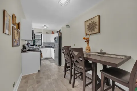 a view of a dining room with furniture