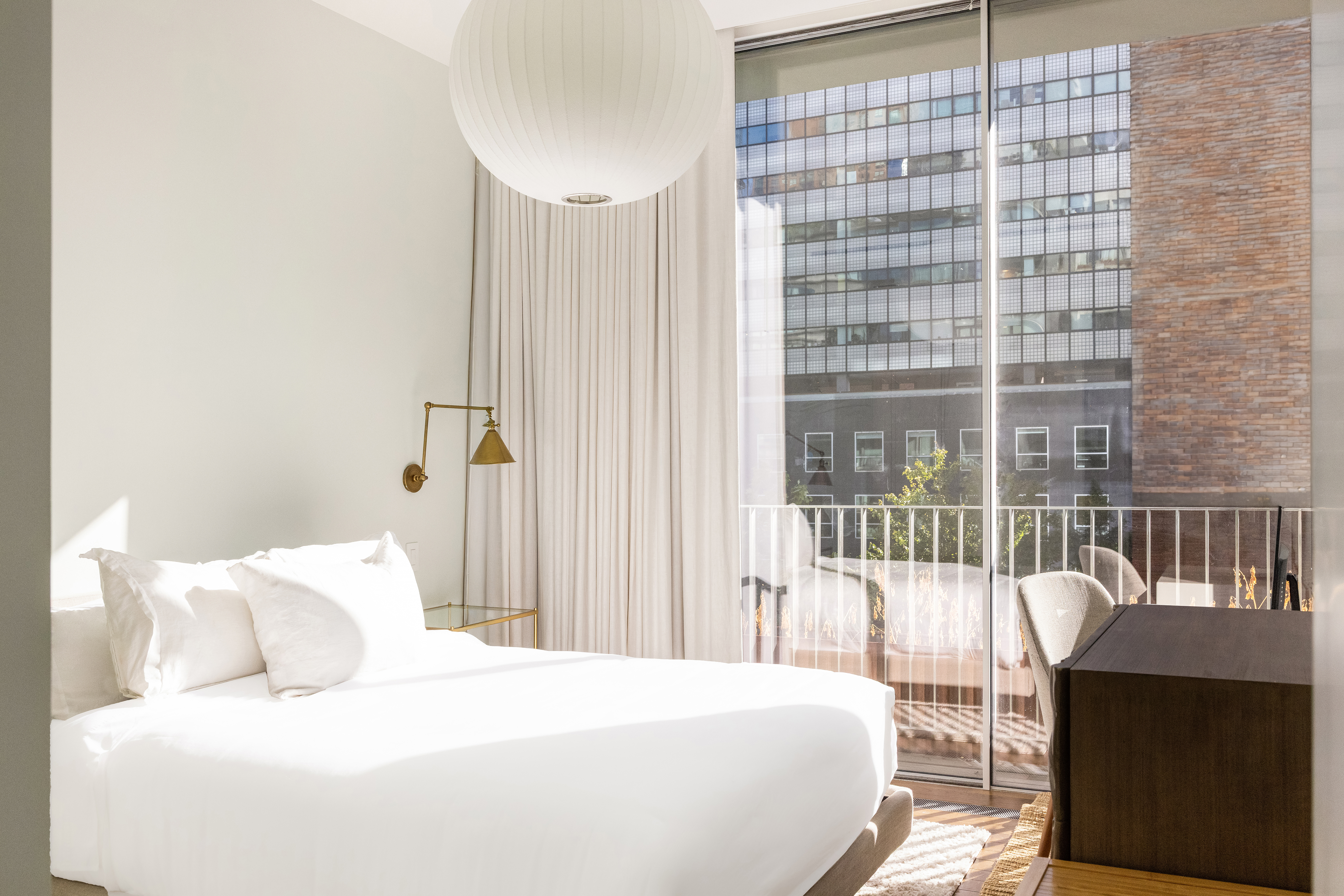 527 West 27th Street, Unit 4C Manhattan, NY 10001 - Photo 11 of 25 a bedroom with a bed and a window