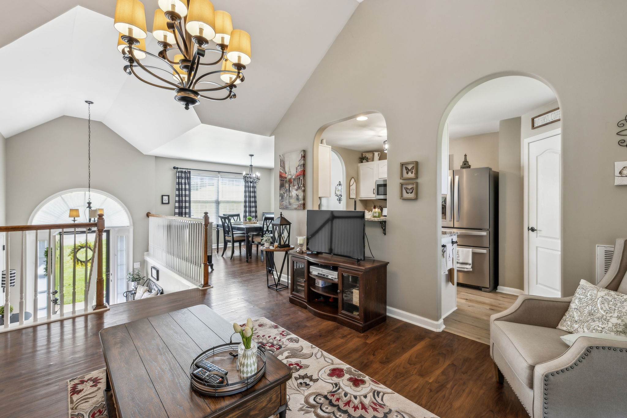 405 Billy Lane Spring Hill, TN 37174 - Photo 13 of 39 a living room with furniture and a chandelier