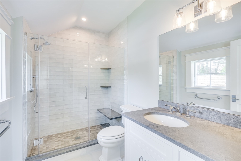 181 Dedham Street Dover, MA 02030 - Photo 8 of 19 a bathroom with a sink a toilet and shower