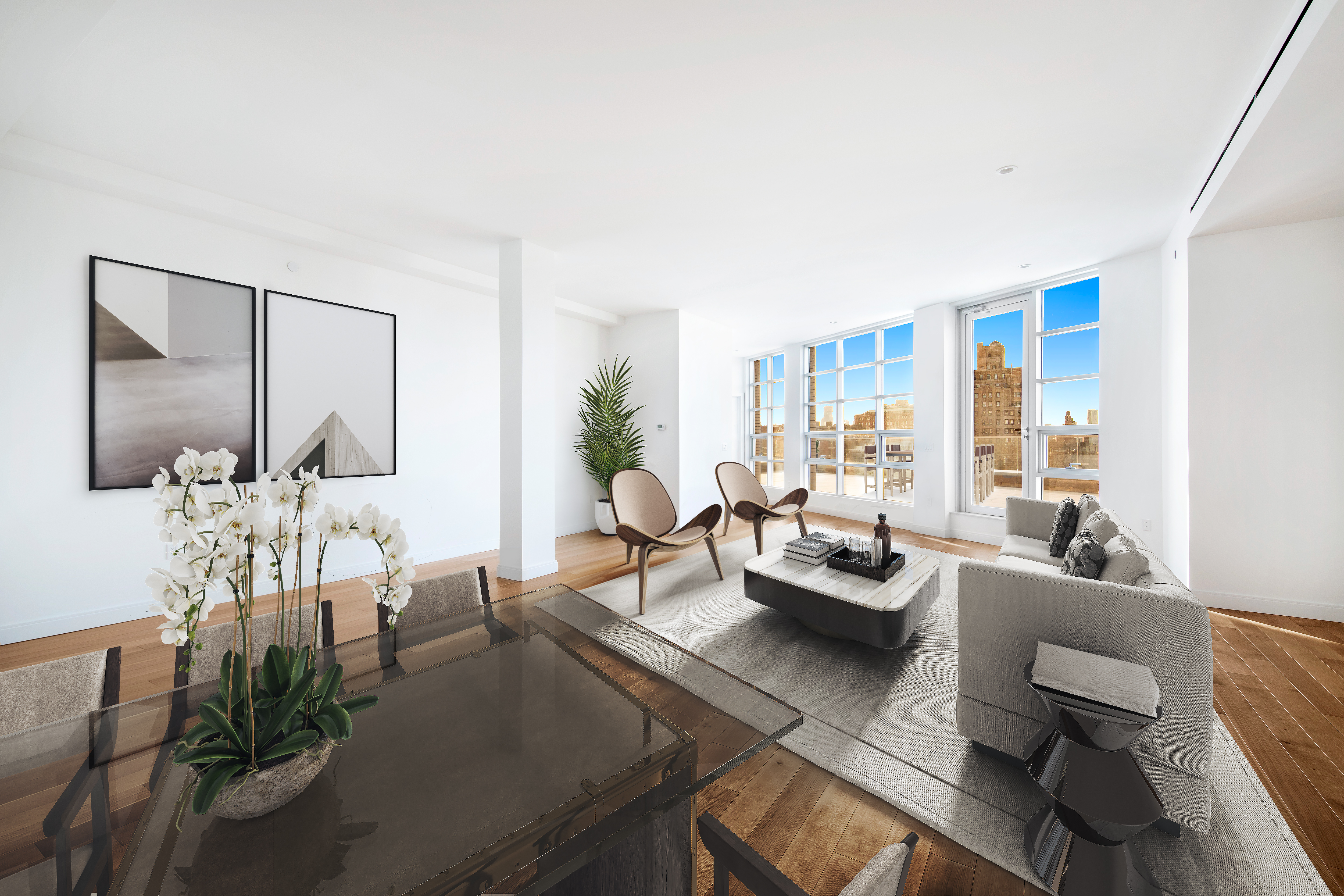 117 7th Avenue South, Unit PH Manhattan, NY 10014 - Photo 2 of 5 a living room with furniture and a large window