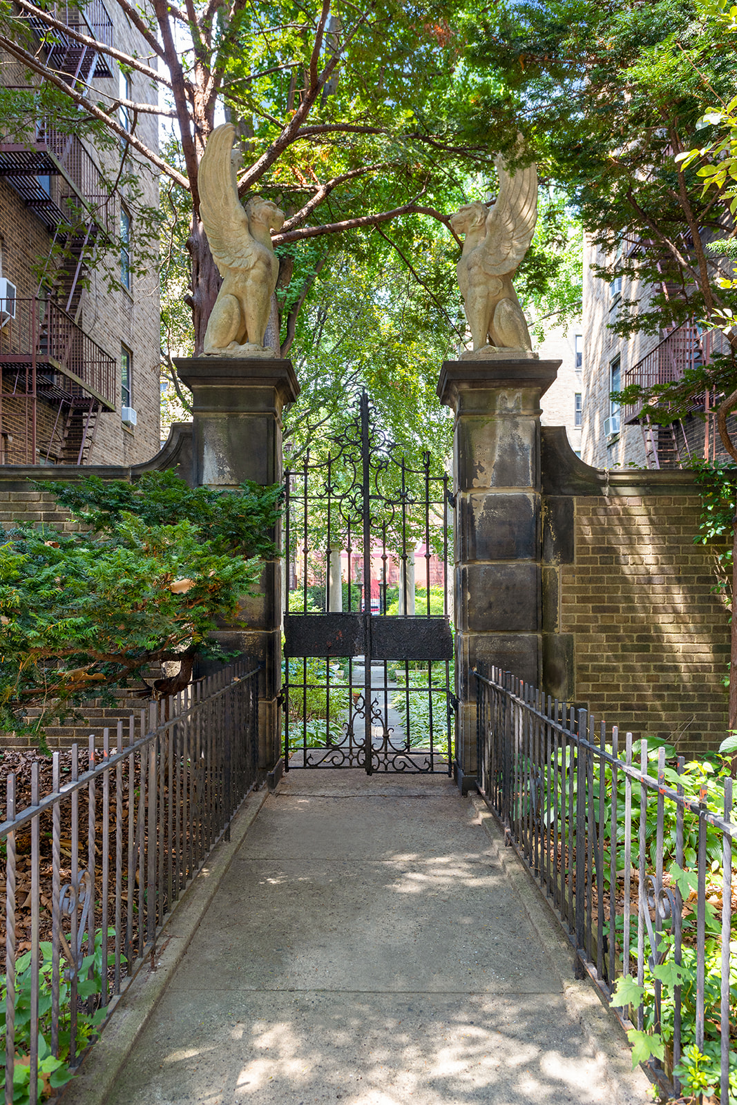 33-35 81st Street, Unit 5A Queens, NY 11372 - Photo 8 of 12 a street view of a house with a yard