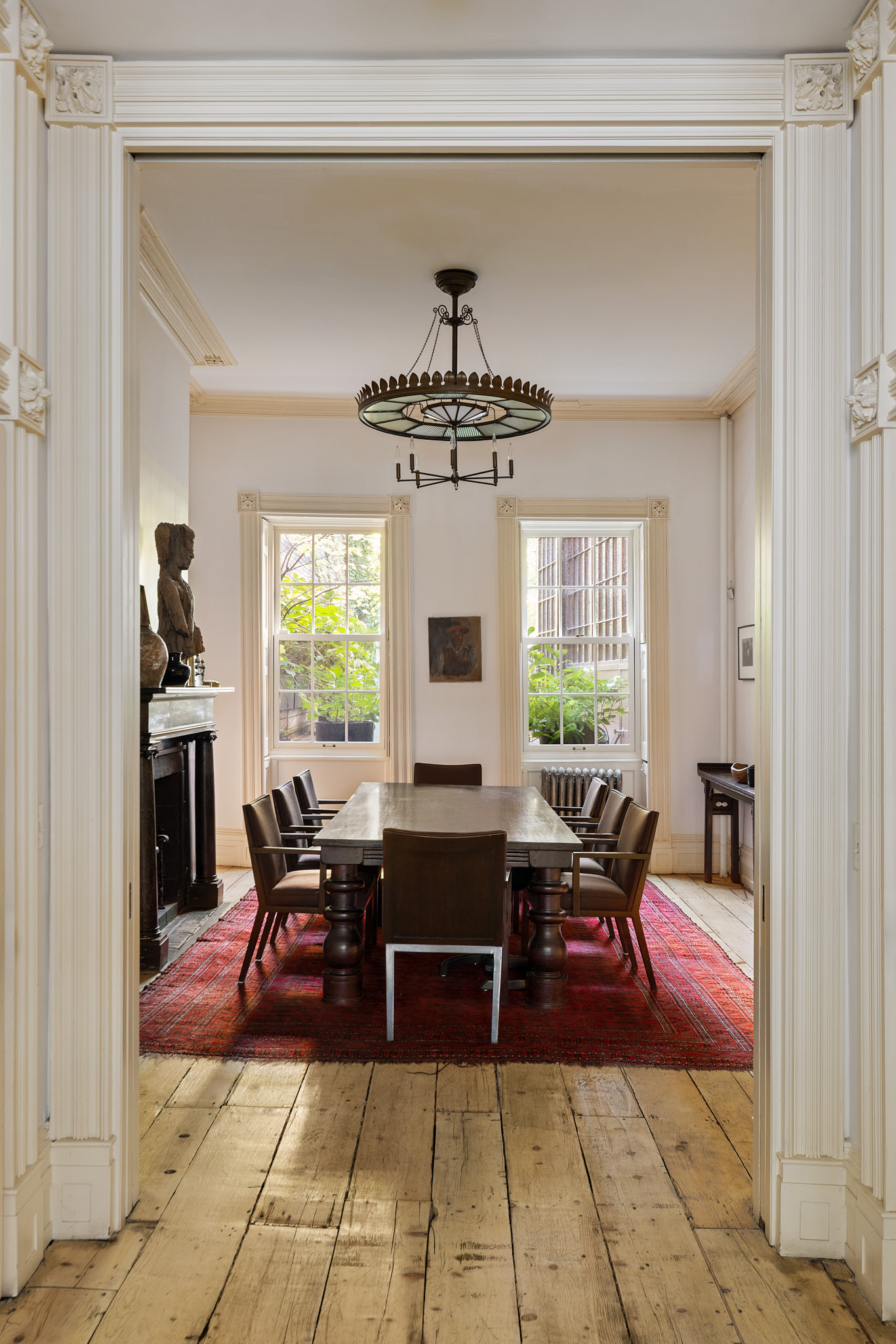 13 Vandam Street Manhattan, NY 10014 - Photo 4 of 26 a living room with furniture a chandelier and a window