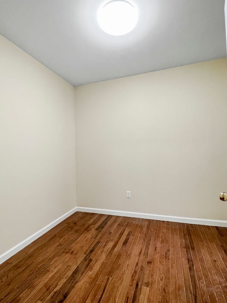 270 East 78th Street, Unit 1 Manhattan, NY 10075 - Photo 4 of 6 a view of a room with wooden floor