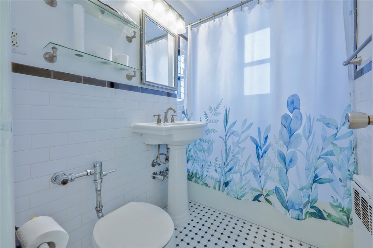 1270 East 51st Street, Unit 6X Brooklyn, NY 11234 - Photo 13 of 17 a bathroom with a sink toilet and shower