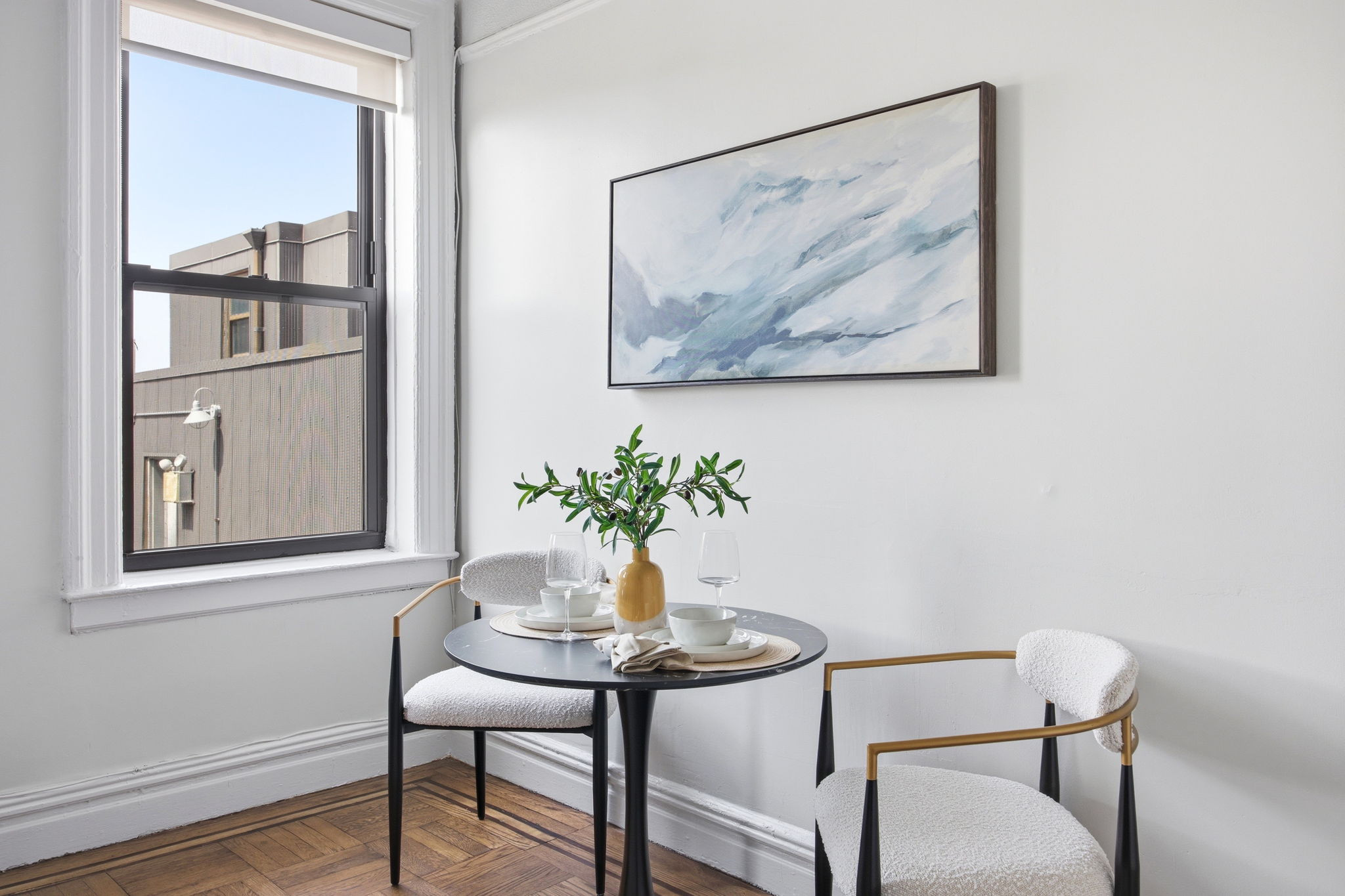485 Central Park West, Unit 7A Manhattan, NY 10025 - Photo 4 of 15 a view of a workspace room with furniture and wooden floor