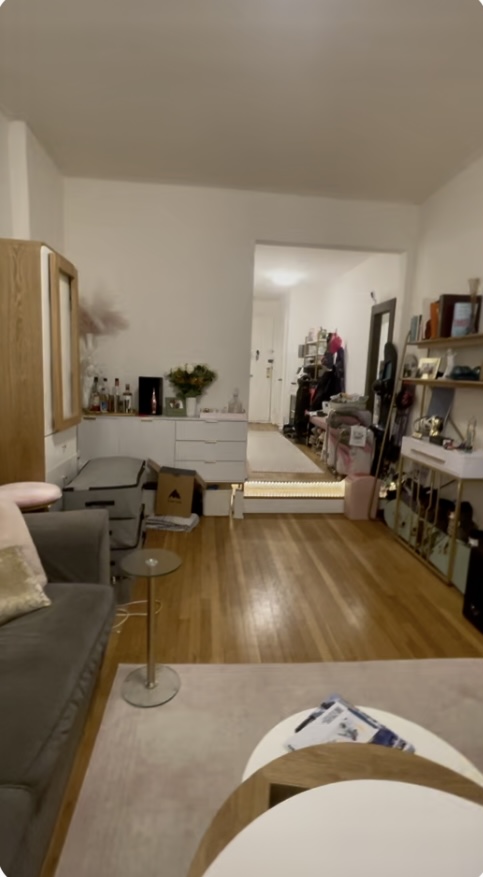 330 East 58th Street, Unit 1C Manhattan, NY 10022 - Photo 5 of 9 a living room with furniture