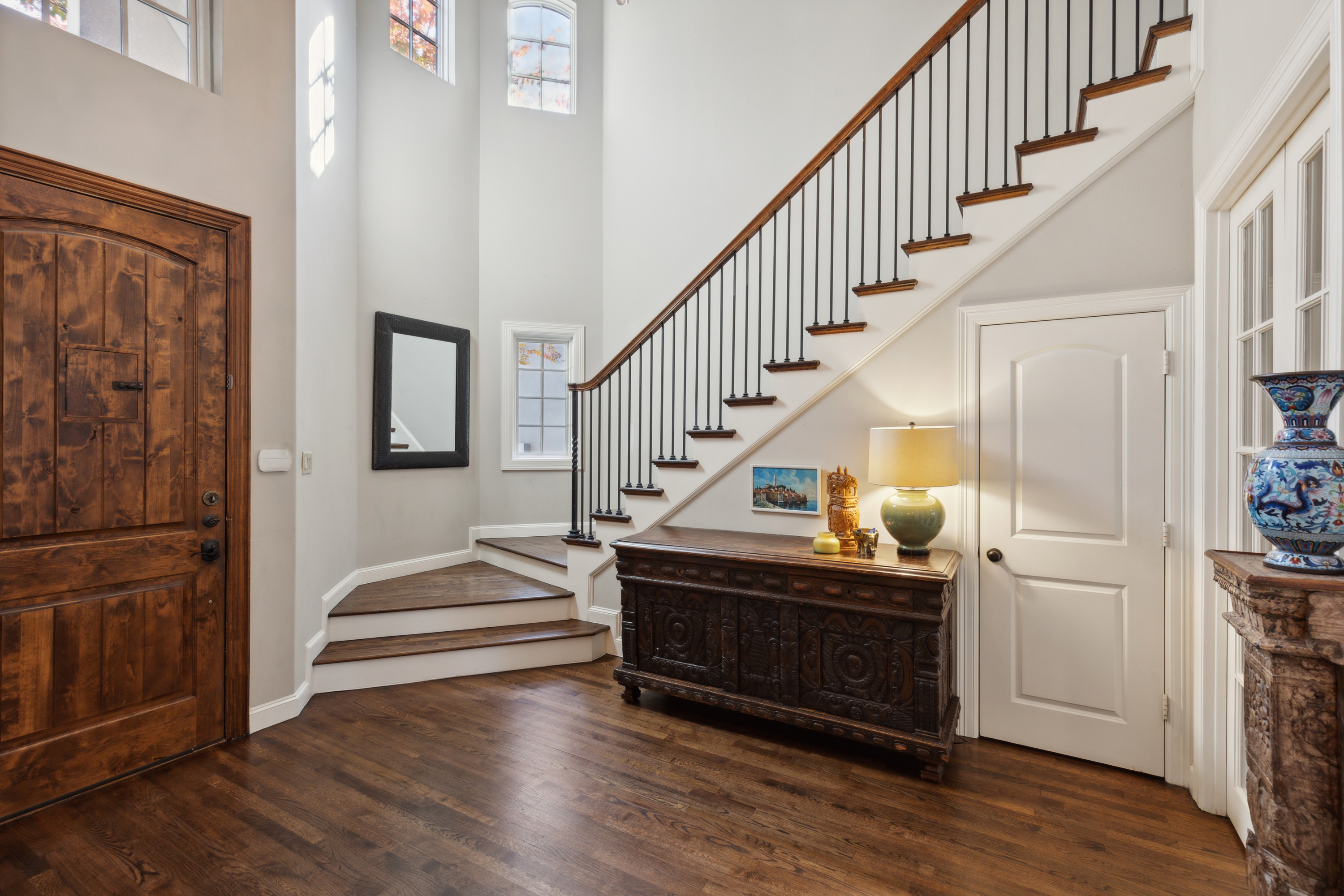 8411 Midway Road Dallas, TX 75209 - Photo 4 of 29 a view of entryway and hall with wooden floor