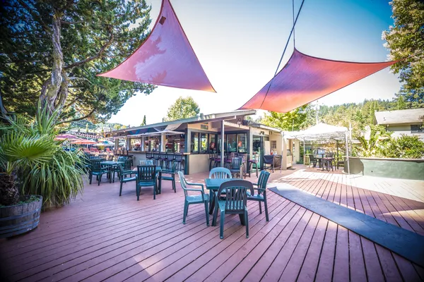 a view of a chairs and table in the patio
