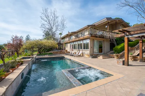 a view of a house with pool