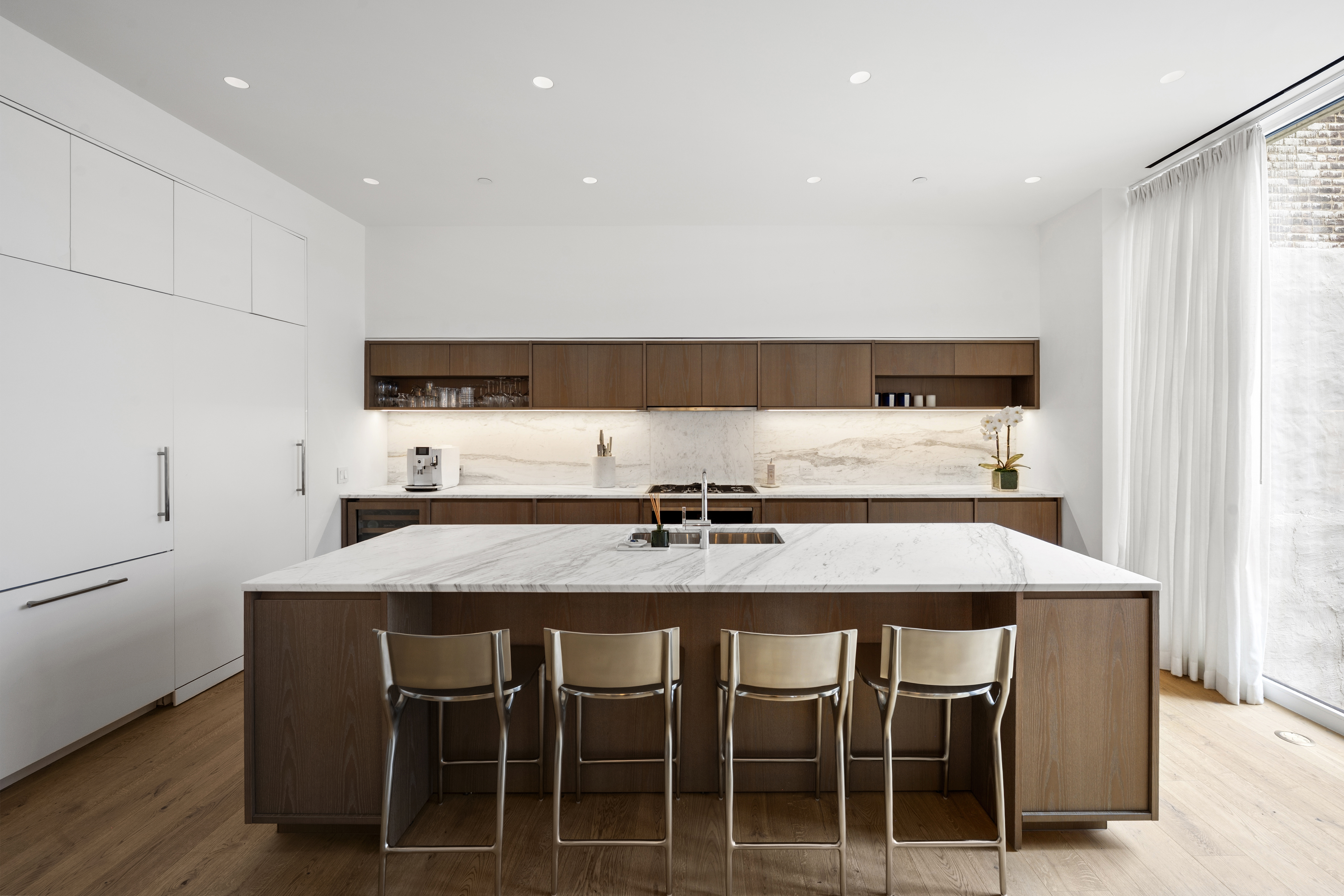 532 West 20th Street, Unit 4 Manhattan, NY 10011 - Photo 6 of 23 a kitchen with a table and chairs in it