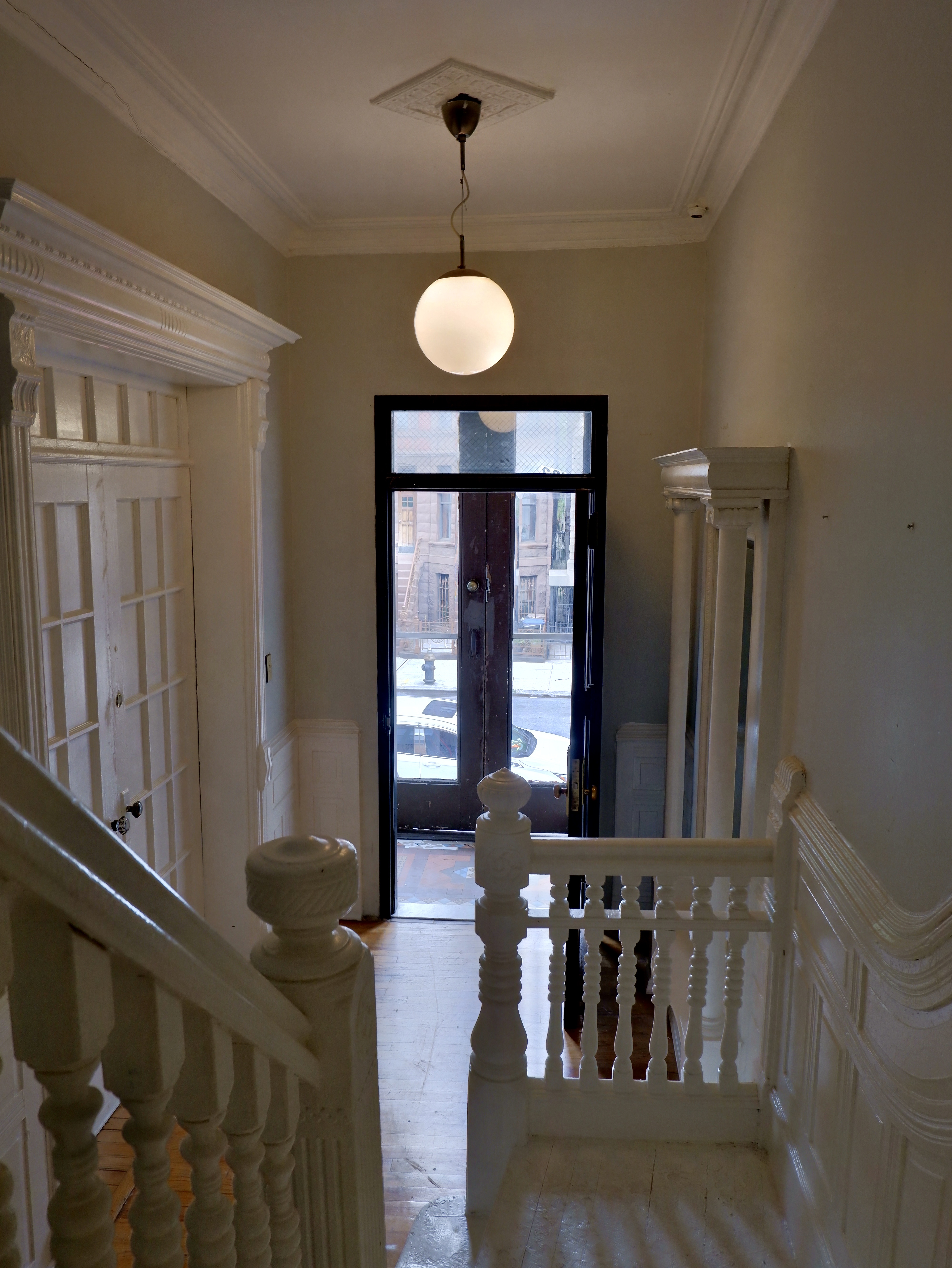 132 Decatur Street, Unit 3 Brooklyn, NY 11216 - Photo 3 of 17 a view of a room with a large mirror and furniture