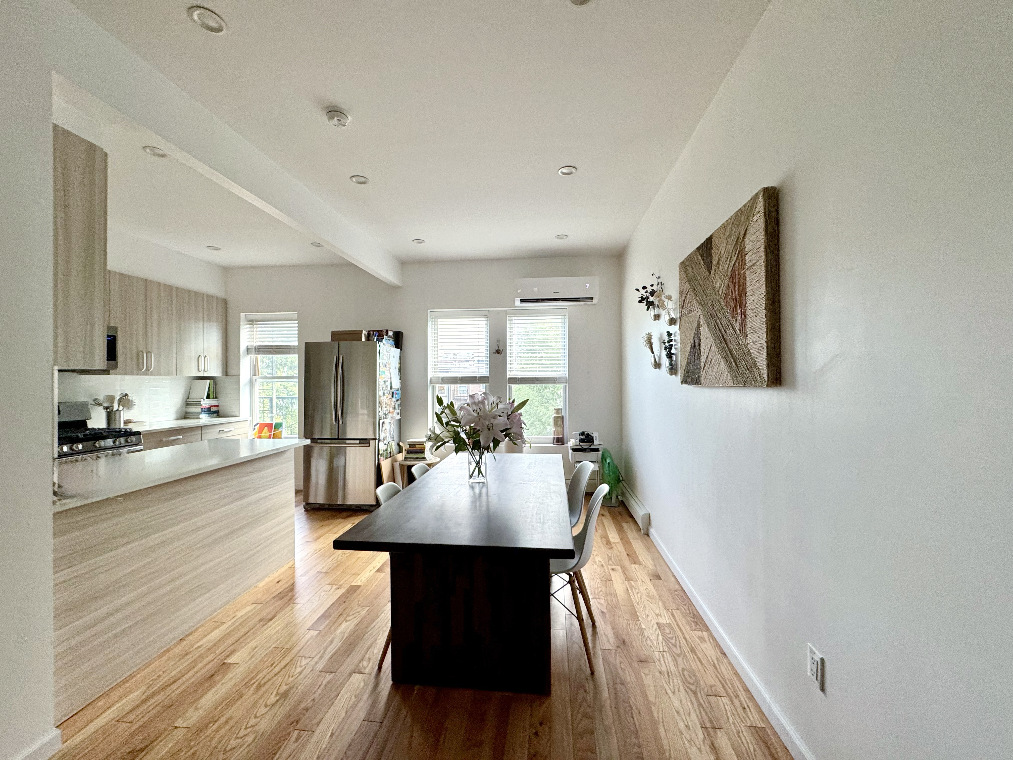 175 Luquer Street, Unit 4 Brooklyn, NY 11231 - Photo 7 of 21 a view of a dining room with furniture window and wooden floor