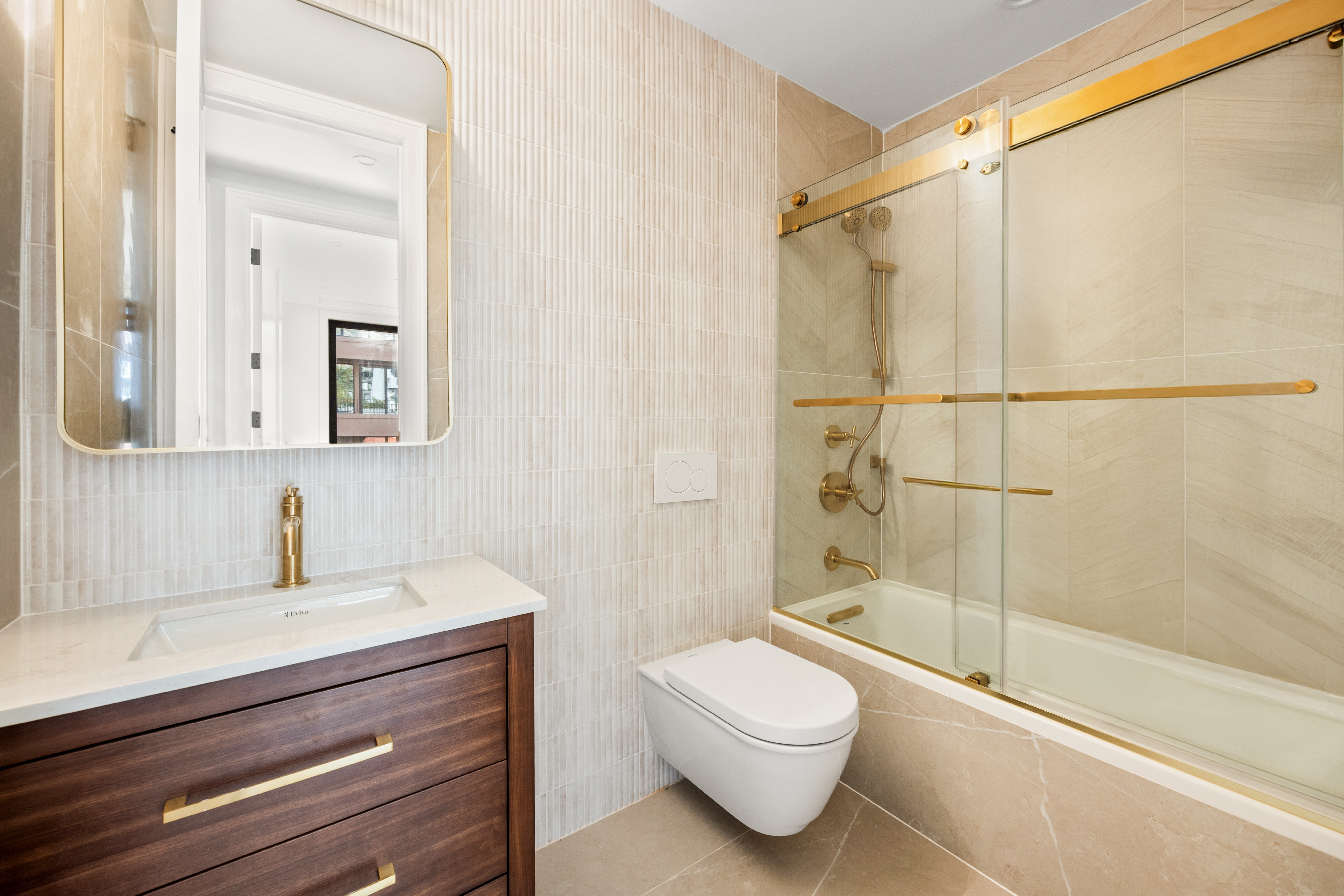 354 Dean Street, Unit 3 Brooklyn, NY 11217 - Photo 14 of 18 a bathroom with a sink a toilet and shower