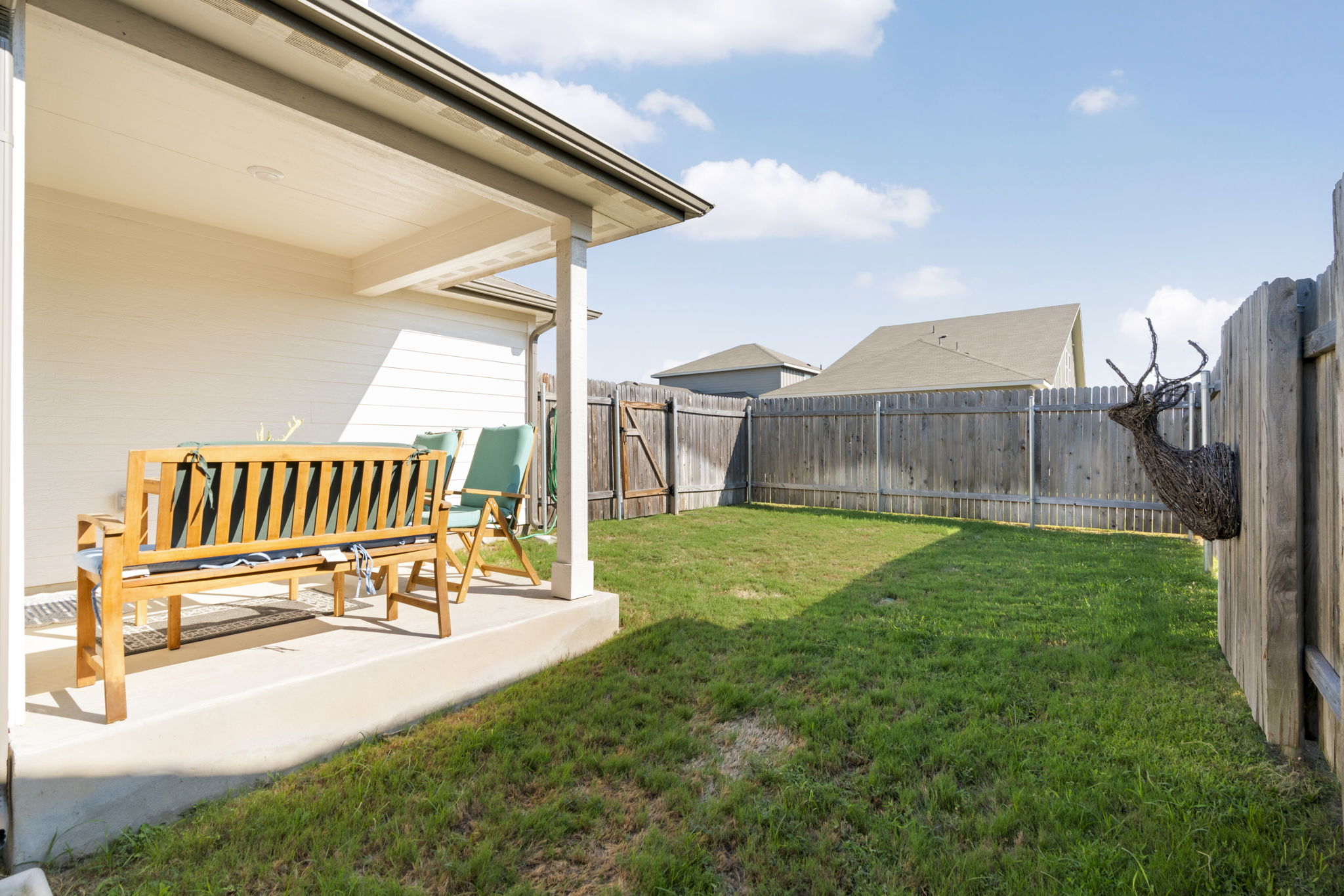 107 Magnolia Ranch Lane Hutto, TX 78634 - Photo 24 of 28 Fenced backyard featuring a patio