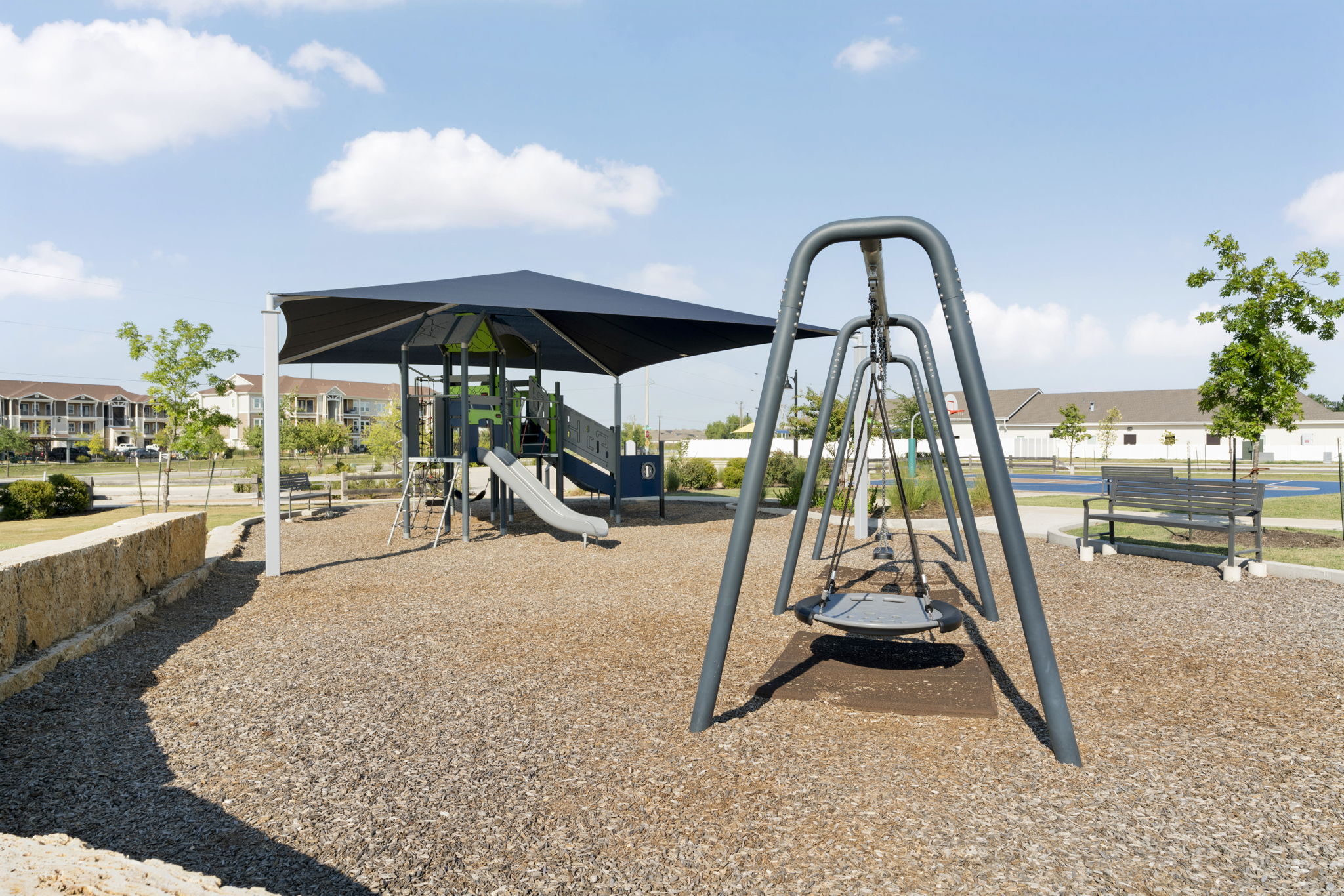 107 Magnolia Ranch Lane Hutto, TX 78634 - Photo 26 of 28 View of communal playground