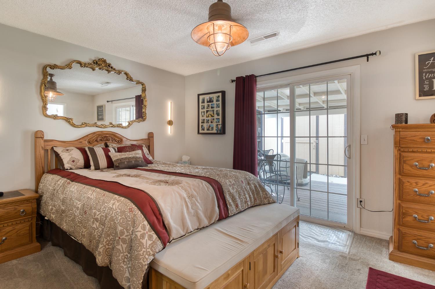 2016 Don Pedro Road Ceres, CA 95307 - Photo 19 of 28 Master bedroom with sliding glass door to back patio.