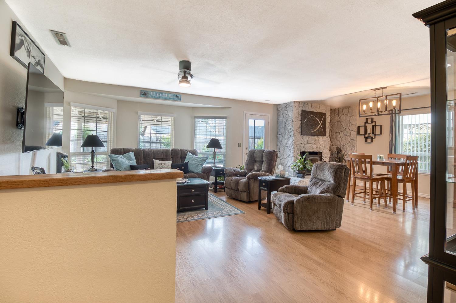 2016 Don Pedro Road Ceres, CA 95307 - Photo 4 of 28 Family room and dining room with fireplace