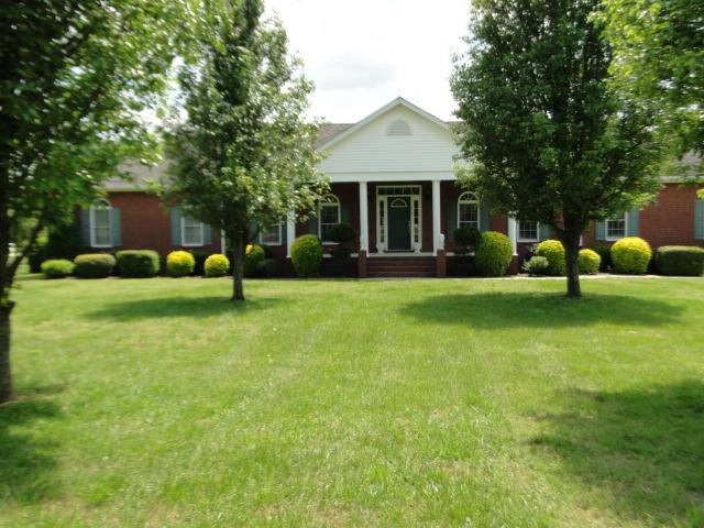 256 Edd Joyce Road Bell Buckle, TN 37020 - Photo 1 of 20 3,407 sq' brick one level home on 38 acres, fenced cross fenced with barn & sheds.