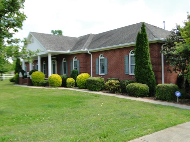 256 Edd Joyce Road Bell Buckle, TN 37020 - Photo 2 of 20 Custom brick with 3 BRs 3.5 baths plus shower in the utility room.