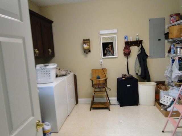 256 Edd Joyce Road Bell Buckle, TN 37020 - Photo 13 of 20 11x11 utility room with had wash sink & shower to clean up after working in the yard.