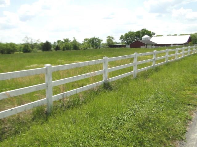 256 Edd Joyce Road Bell Buckle, TN 37020 - Photo 20 of 20 Farm has good road frontage with white vinyl fencing.