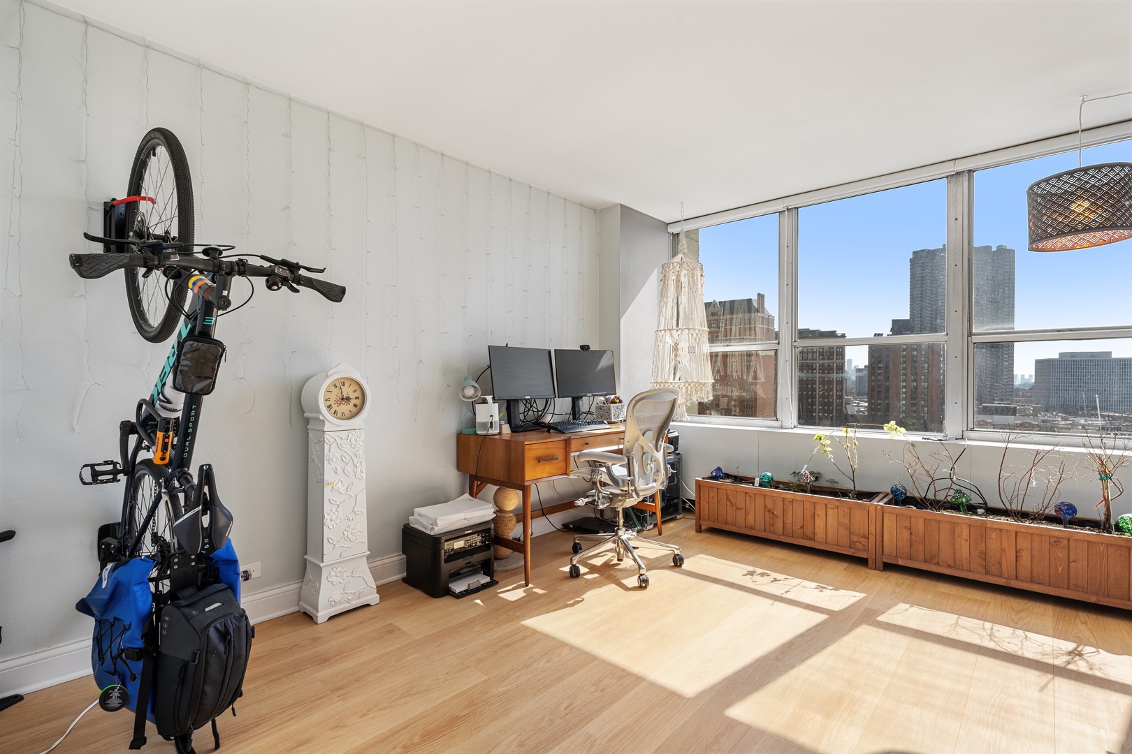 655 West Irving Park Road, Unit 1101 Chicago, IL 60613 - Photo 15 of 24 a living room with furniture and a window