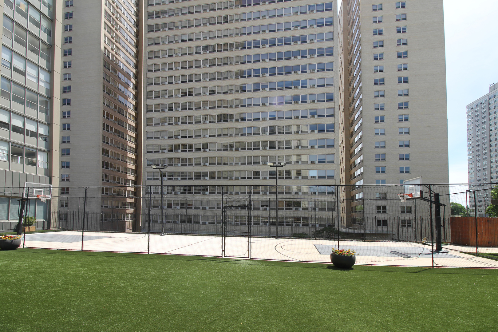 655 West Irving Park Road, Unit 1101 Chicago, IL 60613 - Photo 19 of 24 a view of an apartment with a garden