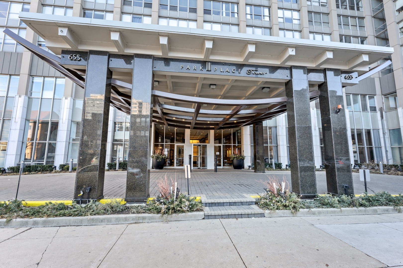 655 West Irving Park Road, Unit 1101 Chicago, IL 60613 - Photo 2 of 24 a view of a building with a street