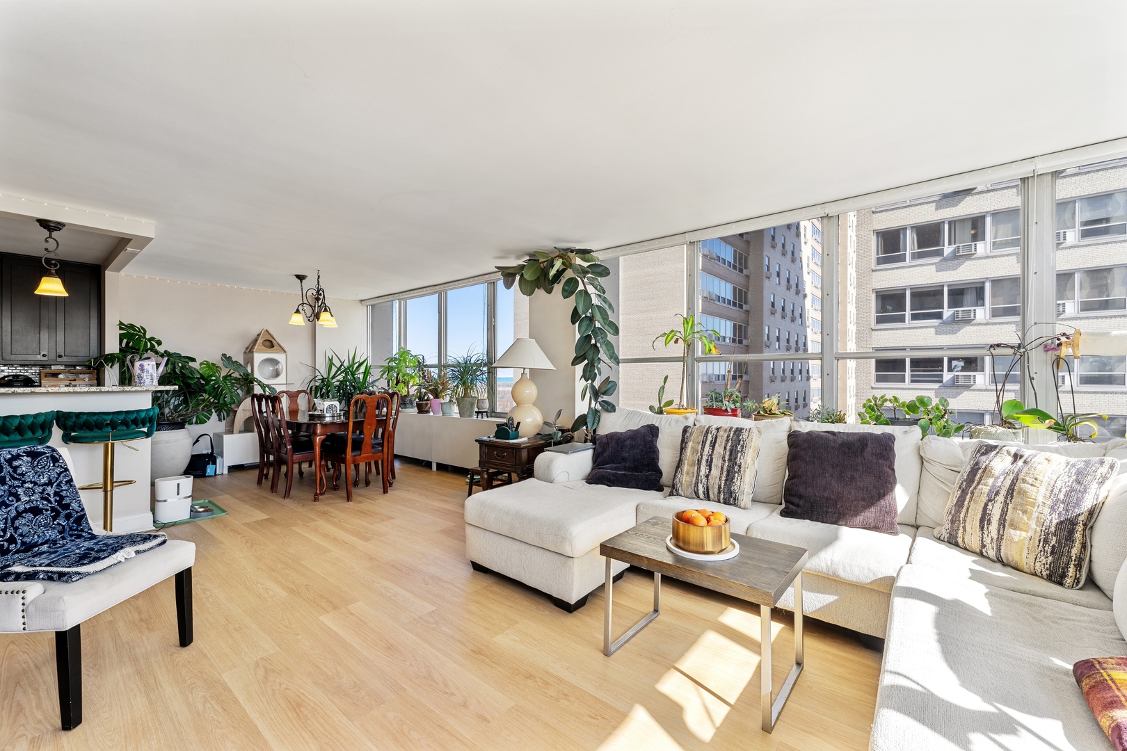 655 West Irving Park Road, Unit 1101 Chicago, IL 60613 - Photo 3 of 24 a living room with furniture and a large window