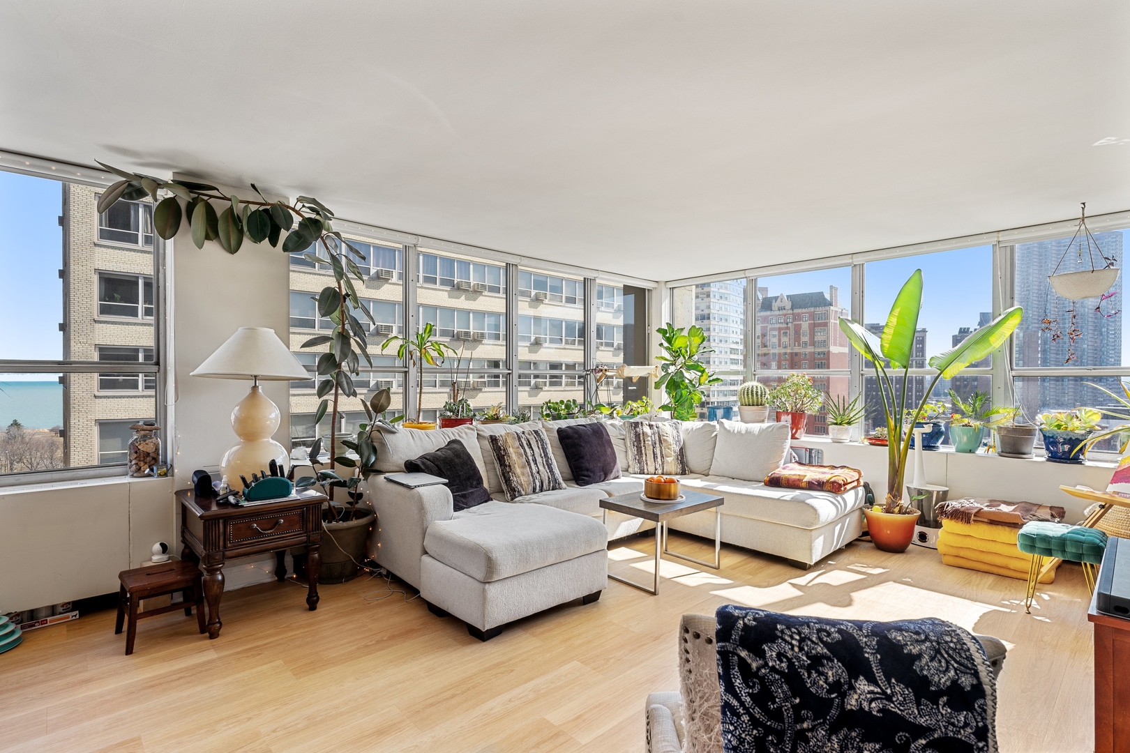 655 West Irving Park Road, Unit 1101 Chicago, IL 60613 - Photo 4 of 24 a living room with furniture and a large window