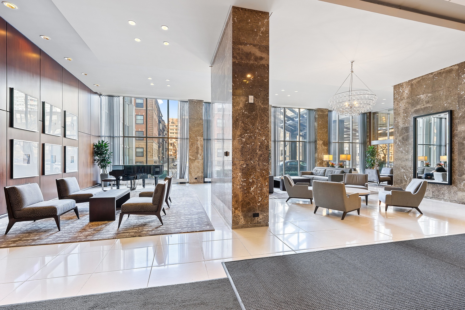 655 West Irving Park Road, Unit 1101 Chicago, IL 60613 - Photo 9 of 24 a living room with fireplace furniture and a large window