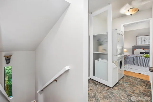 a view of an entryway and livingroom