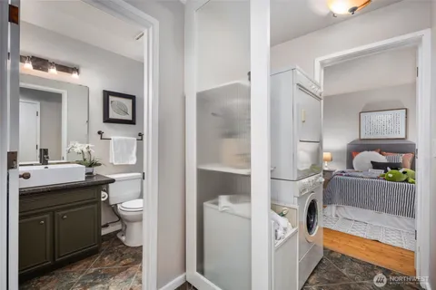 a kitchen with a sink and wooden cabinets