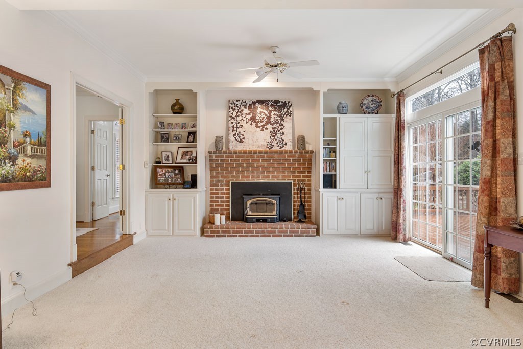 14440 Newgate Road Midlothian, VA 23113 - Photo 8 of 45 a view of a livingroom with an empty space and a fireplace