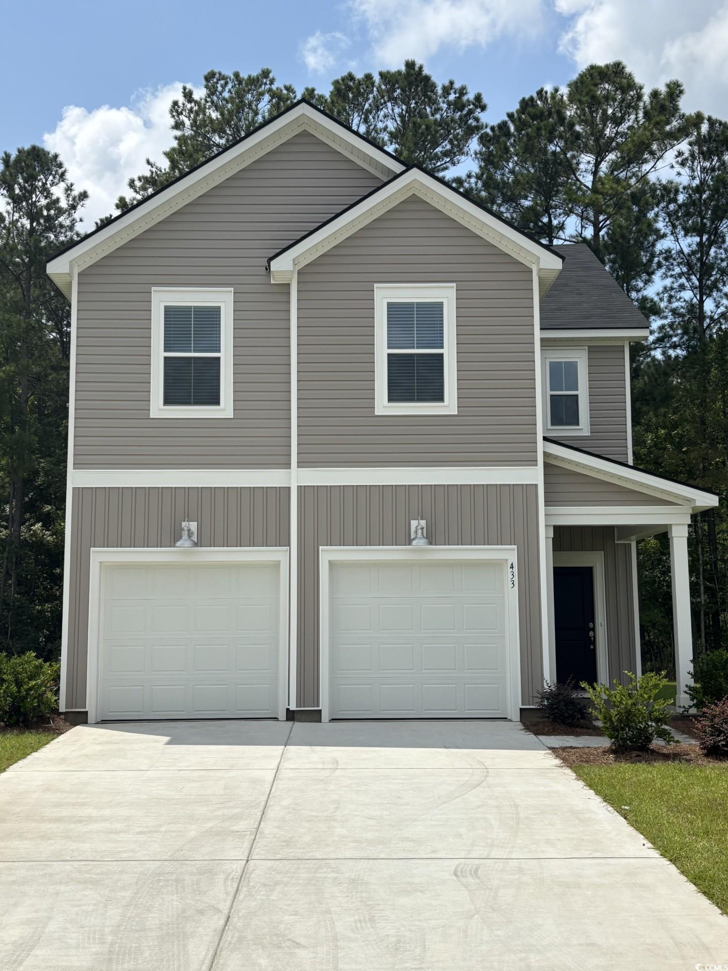 433 Falling Leaf Loop Myrtle Beach, SC 29588 - Photo 1 of 20 View of front of property featuring driveway, an a