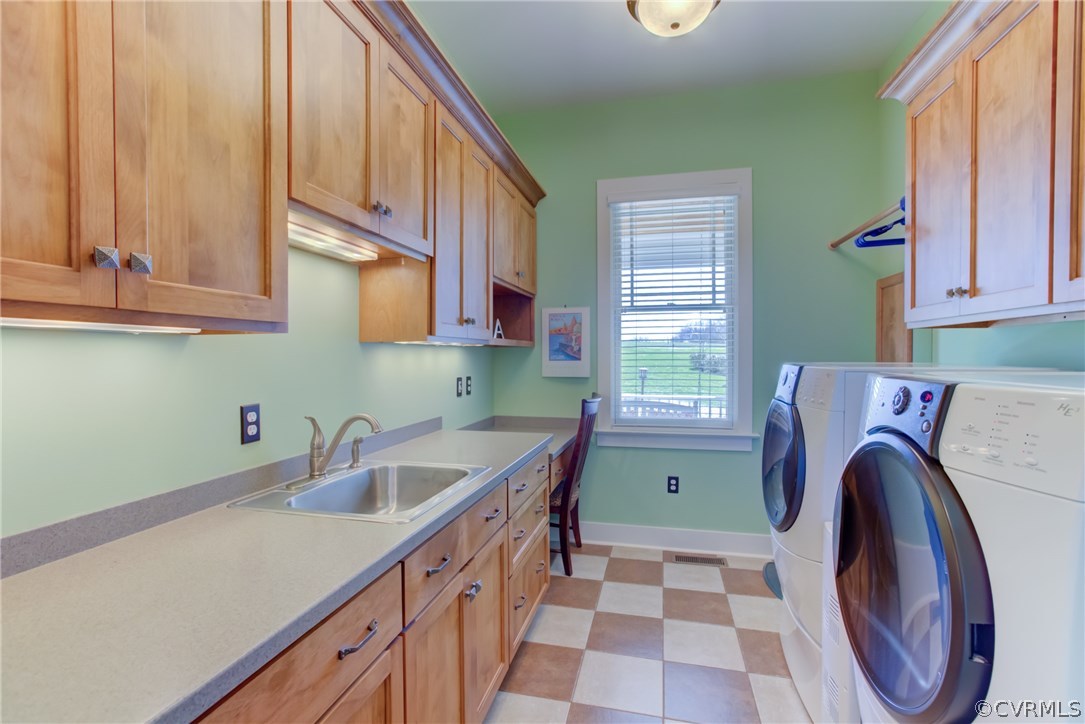 700 Meadow View Ridge Manakin-Sabot, VA 23103 - Photo 27 of 46 Utility Room has sink, built Ins, ironing board, l