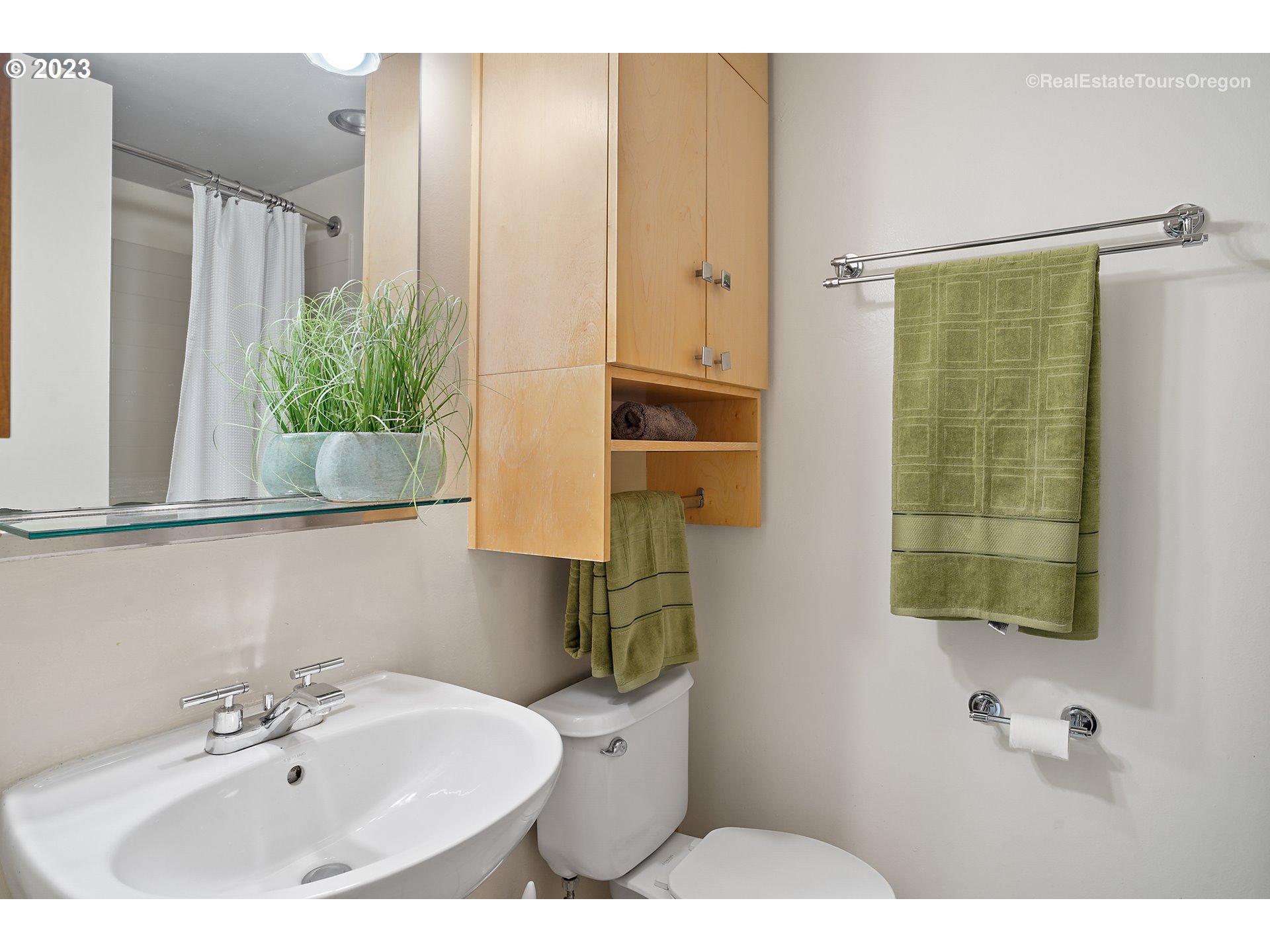 255 Southwest Harrison Street, Unit 3A Portland, OR 97201 - Photo 14 of 19 a bathroom with a sink and a mirror