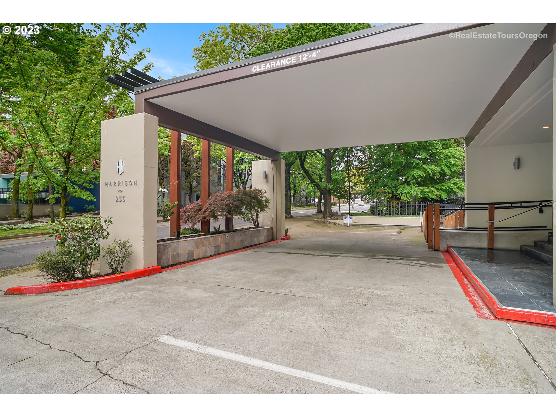 255 Southwest Harrison Street, Unit 3A Portland, OR 97201 - Photo 3 of 19 a backyard of a house with table and chairs