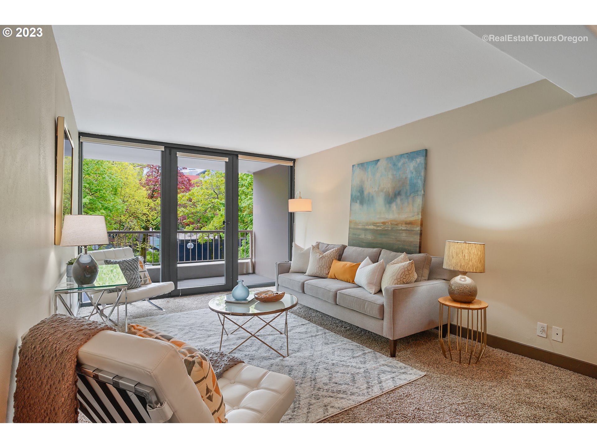255 Southwest Harrison Street, Unit 3A Portland, OR 97201 - Photo 10 of 19 a living room with furniture and a large window