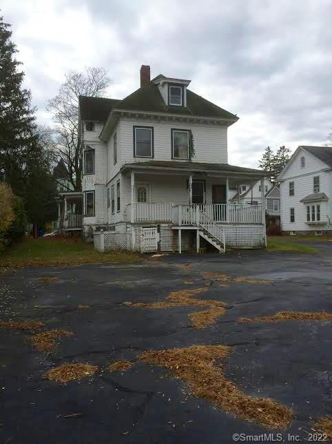 23 Williams Street Norwich, CT 06360 - Photo 1 of 1 a front view of a house with a yard