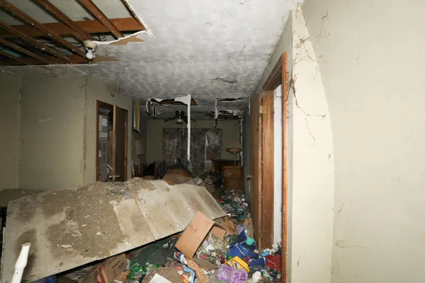 a view of a dining room with furniture and a fireplace